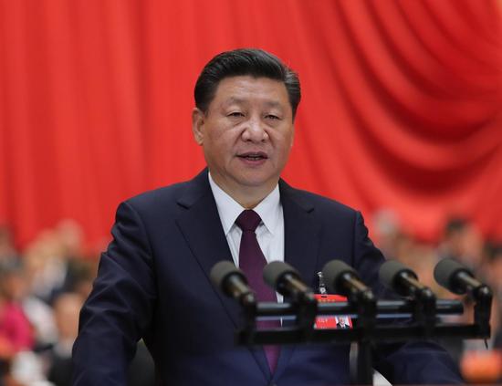 　10月18日，習近平在中國共產(chǎn)黨第十九次全國代表大會上作報告。新華社記者 鞠鵬 攝